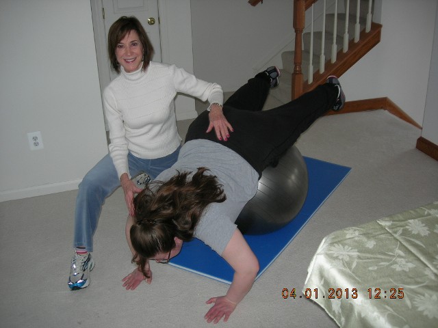 Amy Doing Push Ups on a Ball